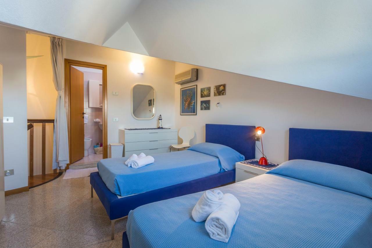 Appartement Lignano Sabbiadoro Flat Garage Extérieur photo